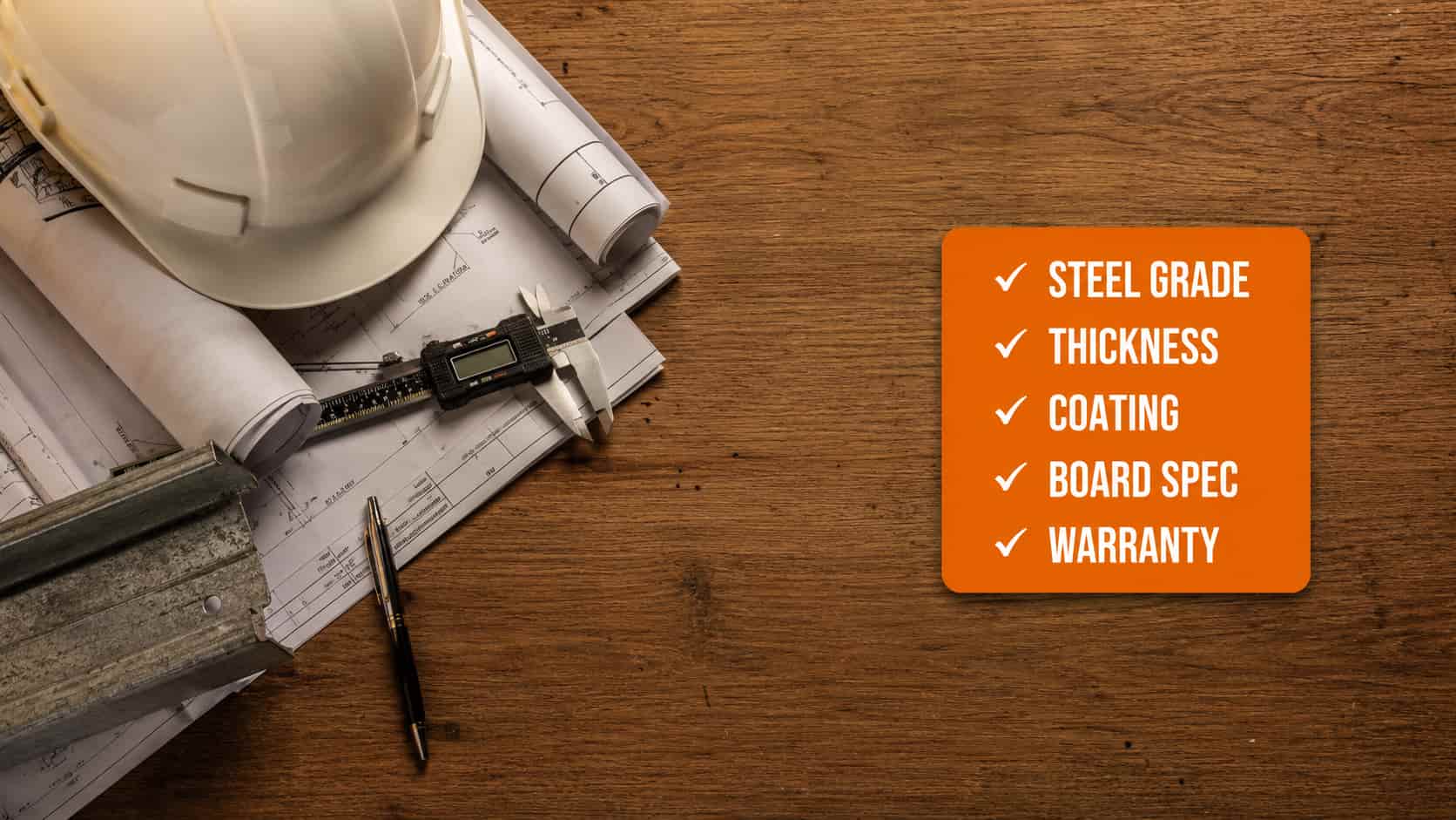 Structural drawings, hard hat, caliper and steel offcut on a desk with an LGSF specification checklist